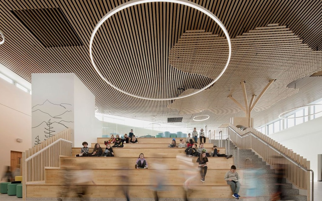 Newmains and St Bridig school interior atrium stairs with children