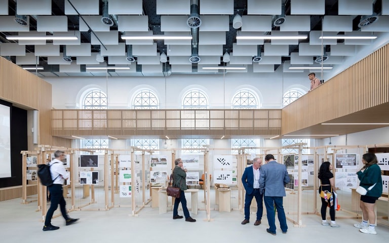 Welsh School of Architecture_visitors reviewing an exhbition