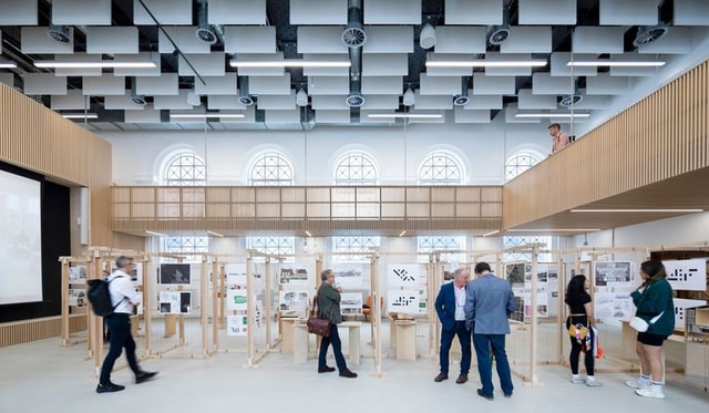 Welsh School of Architecture_visitors reviewing an exhbition